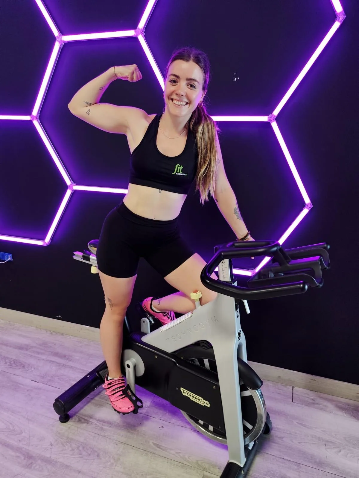 Spinning instructor on a Technogym bike